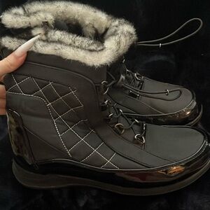 Black and white fur boots
